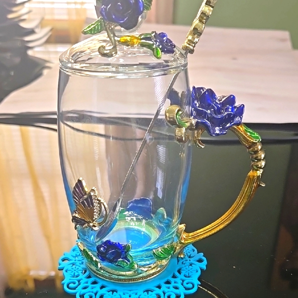 Elegant Glass Mug with Blue Floral Design